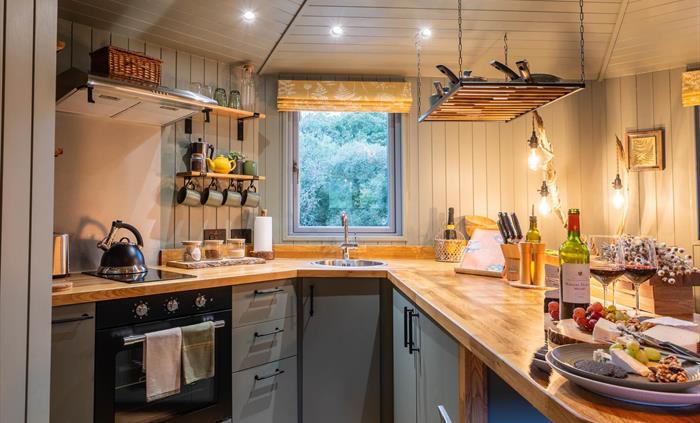 The Cabin at Erwain Escapes has a fully fitted open plan kitchen - Luxury Glamping Cabin Carmarthenshire, West Wales